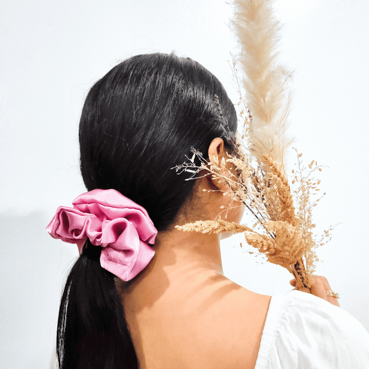 lady with scrunchie in her hair