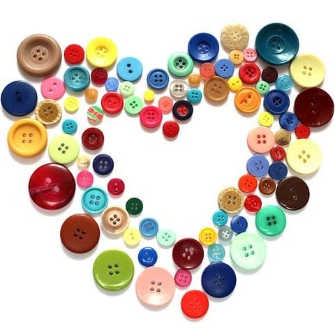 a heart shape made of buttons